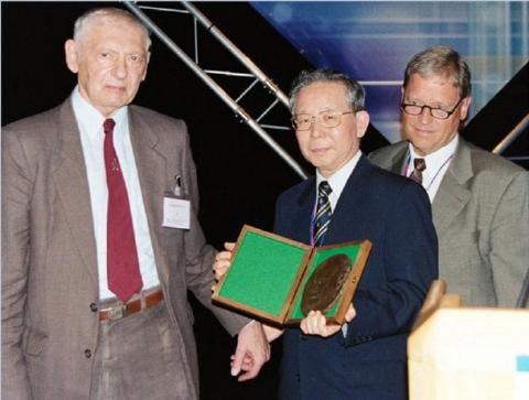 Michael Woolfson is awarded the sixth Ewald Prize at the Opening Ceremony of the IUCr Congress in Geneva.